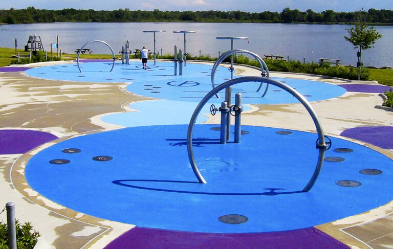 Splash Pad being built. Large circle with Polysoft applied (blue)