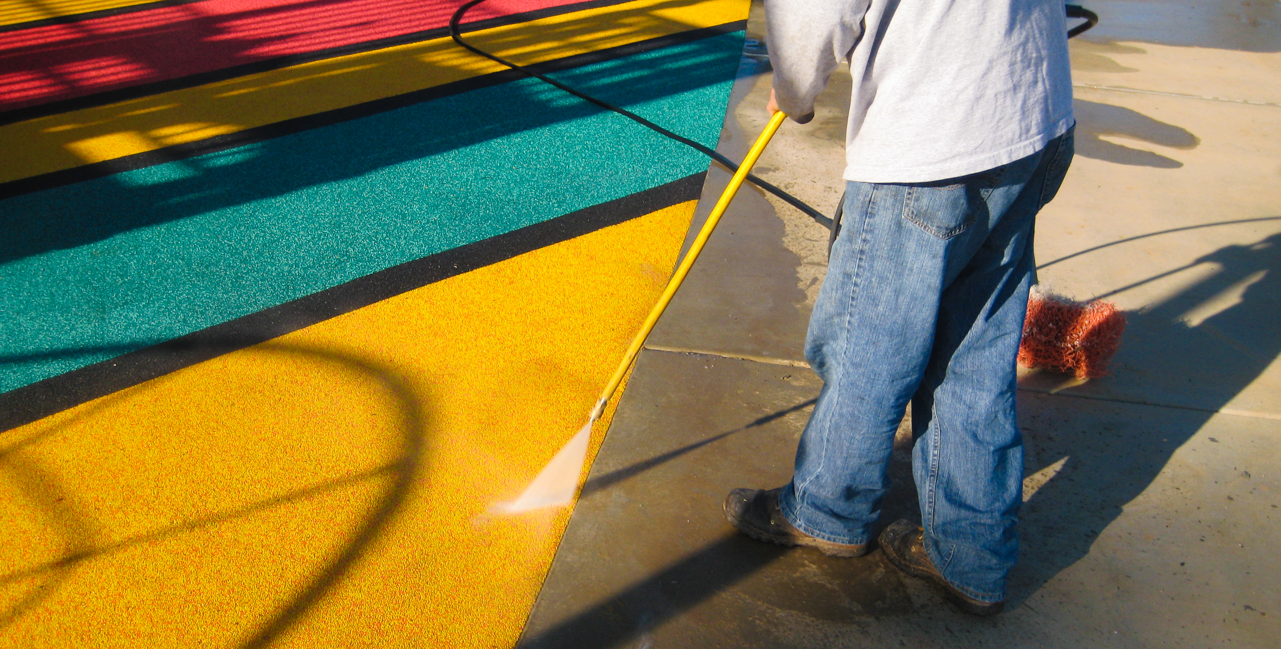 Safety surface removal services by AquaSeal Resurfacing, LLC