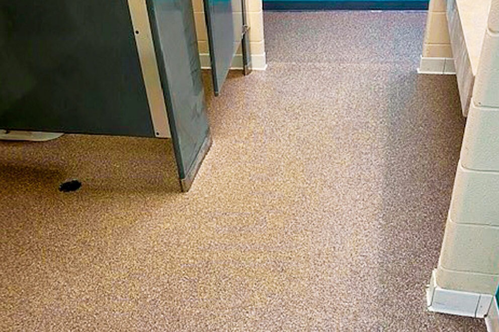Flecks Cast Non-Porous Safety Surfacing System by AquaSeal Resurfacing