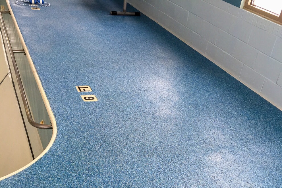 Flecks Cast Non-Porous Safety Surfacing System by AquaSeal Resurfacing